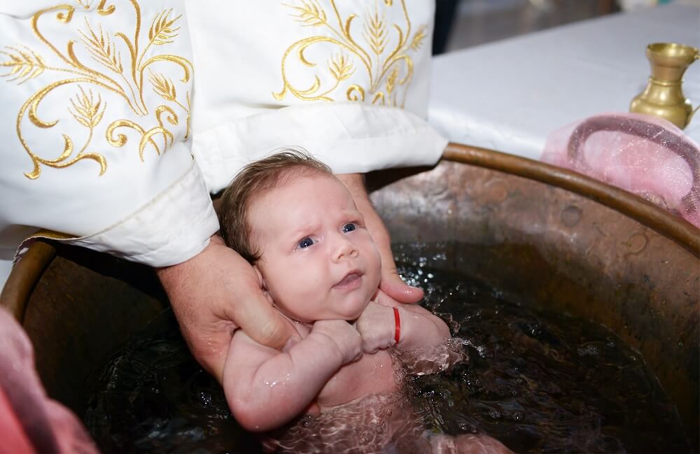 Newborn baby water baptism ritual